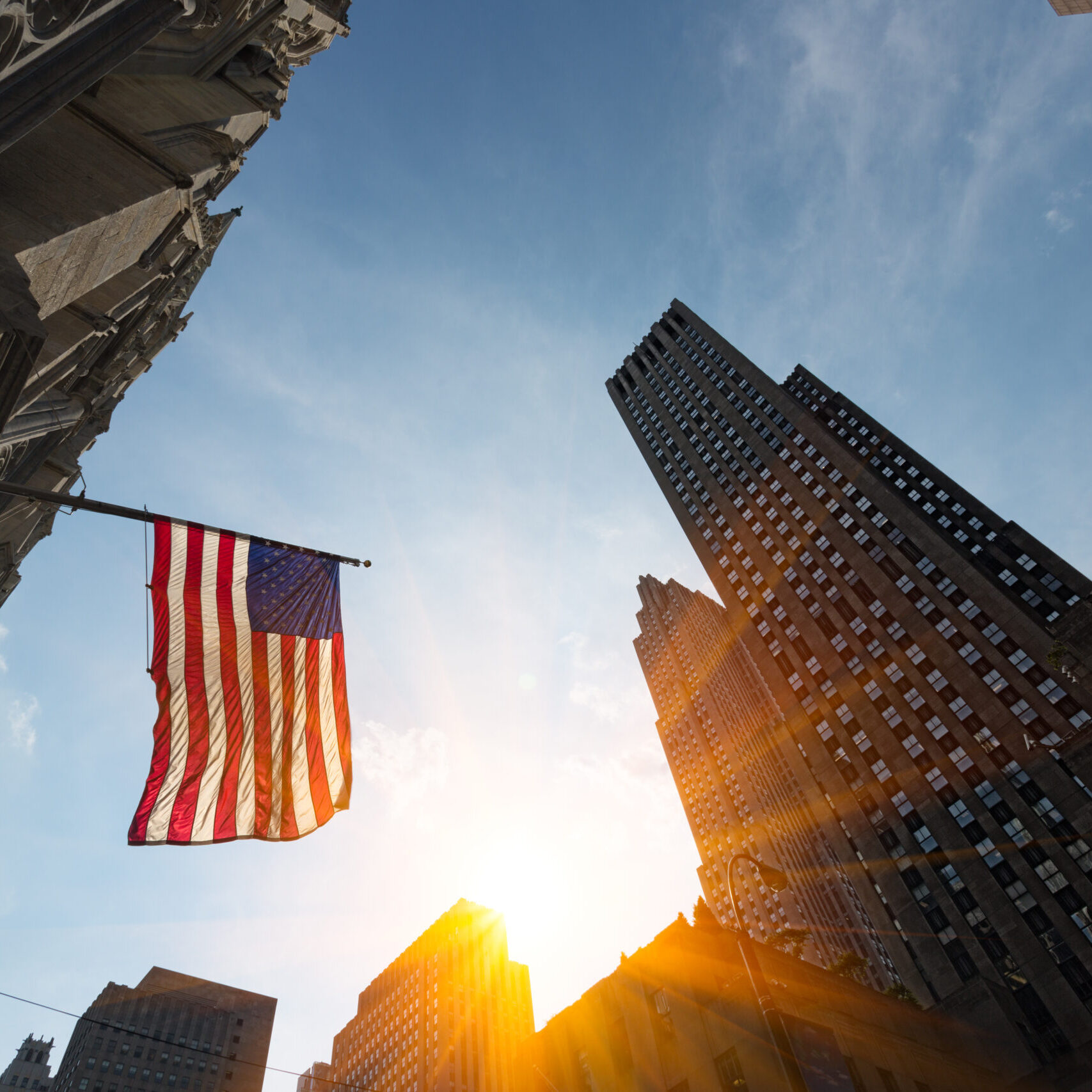 High,Rise,Buildings,And,Us,Flag,,Business,District,,New,York